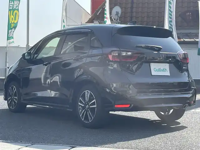 ホンダ フィット e:HEV RS 岡山県 2025(令7)年 0.8万km クリスタルブラックパール 登録時走行距離7288km/純正HDDナビ/(AM/FM/BT/DVD/Apple Car Play)/ホンダセンシング/ビルトインETC/ドライブレコーダー前方/フルセグTV/バックカメラ/コーナーセンサー前後/オートライト/衝突被害軽減システム/レーンキープアシスト/クルーズコントロール/アイドリングストップ/横滑り防止装置/盗難防止装置/ABS/パドルシフト/スマートキー/スペアキー1本/保証書/取扱説明書/記録簿