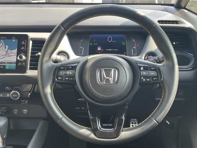 ホンダ フィット e:HEV RS 岡山県 2025(令7)年 0.8万km クリスタルブラックパール 登録時走行距離7288km/純正HDDナビ/(AM/FM/BT/DVD/Apple Car Play)/ホンダセンシング/ビルトインETC/ドライブレコーダー前方/フルセグTV/バックカメラ/コーナーセンサー前後/オートライト/衝突被害軽減システム/レーンキープアシスト/クルーズコントロール/アイドリングストップ/横滑り防止装置/盗難防止装置/ABS/パドルシフト/スマートキー/スペアキー1本/保証書/取扱説明書/記録簿