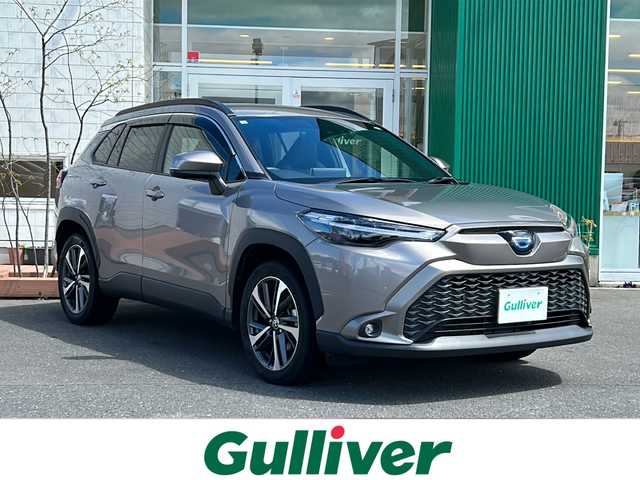 トヨタ カローラ クロス ハイブリッド Z 青森県 2021(令3)年 3.1万km アバンギャルドブロンズメタリック 4WD/寒冷地仕様/OP純正9インチディスプレイオーディオナビ/フルセグTV/BT/USB/Miracast/OPパノラミックビューモニター/ハーフレザーシート/運転席パワーシート/前席シートヒーター/ステアリングヒーター/パワーバックドア/セーフティセンス/プリクラッシュセーフティ/レーダークルーズコントロール/オートマチックハイビーム/レーントレーシングアシスト/OPブラインドスポットモニター/純正ドライブレコーダー/ビルトインETC2.0/OP AC100V電源/社外エンジンスターター/LEDヘッドライト/LEDフォグライト/ルーフレール/純正18インチアルミホイール