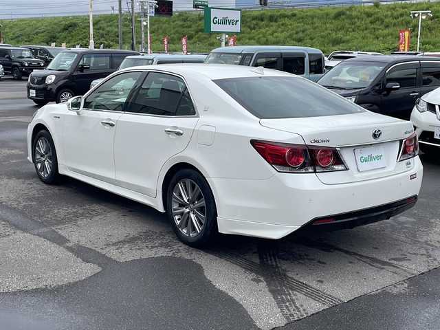 トヨタ クラウン ハイブリッド 青森県 2018(平30)年 7.2万km ホワイトパールクリスタルシャイン ・インテリジェントクリアランスソナー/・カーテンエアバック/・ABS/・純正ナビ（ブルーレイ再生機能付き）/・社外カメラ（バック）/・電動リアゲート/・クルーズコントロール（追従走行有）/・パワーシート（D+N席）/・メモリ機能付きパワーシート（D席）/・エコドライブモード/・純正AW/・スマートキー/・ETC2.0
