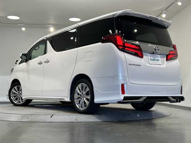 トヨタ アルファード S タイプゴールド 愛知県 2021(令3)年 6万km ホワイトパールクリスタルシャイン 純正９インチディスプレイオーディオ　/（Bluetooth/AM/FM/DVD/USB/Miracast)/純正フリップダウンモニター/モデリスタエアロ（F・R)/両側パワースライドドア　/ＡＣ１００Ｖ　/トヨタセーフティセンス　/　　-プリクラッシュセーフティ/　　-レーントレーニングアシスト/　　-レーダークルーズコントロール/　　-ロードサインアシスト/　　-アダプティブハイビーム/３眼ＬＥＤヘッドライト/LEDフォグランプ　/ビルトインＥＴＣ　/バックカメラ　/クリアランスソナー/電動バックドア/オットマン/プッシュスタート/　　-スマートキー