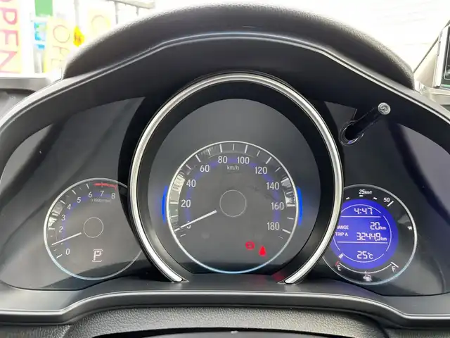 ホンダ フィット 13G Lパッケージ 京都府 2013(平25)年 6.6万km アラバスターシルバーメタリック ワンオーナー/禁煙車/65856キロ/純正ナビ/ワンセグTV/Bluetooth/ETC/バックカメラ/LEDヘットライト/スマートキー２個/保証書/説明書
