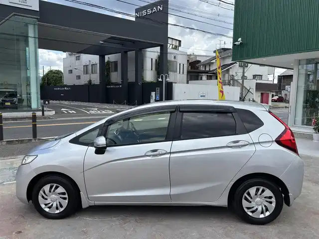 ホンダ フィット 13G Lパッケージ 京都府 2013(平25)年 6.6万km アラバスターシルバーメタリック ワンオーナー/禁煙車/65856キロ/純正ナビ/ワンセグTV/Bluetooth/ETC/バックカメラ/LEDヘットライト/スマートキー２個/保証書/説明書
