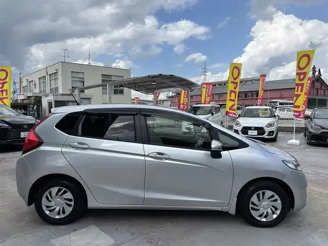 ホンダ フィット 13G Lパッケージ 京都府 2013(平25)年 6.6万km アラバスターシルバーメタリック ワンオーナー/禁煙車/65856キロ/純正ナビ/ワンセグTV/Bluetooth/ETC/バックカメラ/LEDヘットライト/スマートキー２個/保証書/説明書