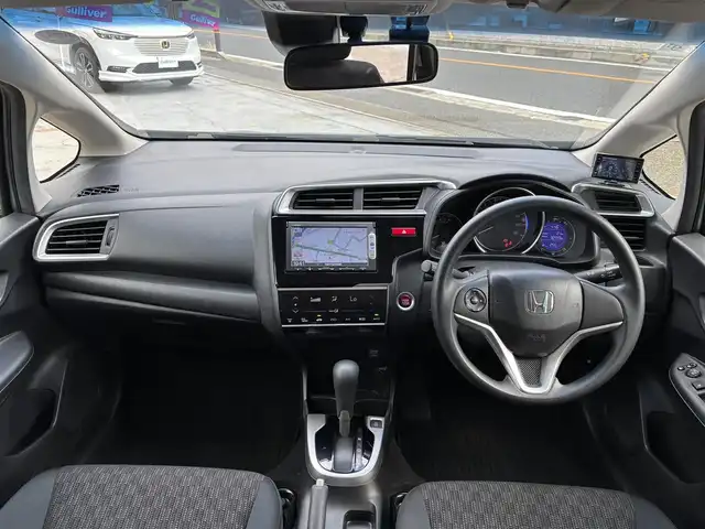 ホンダ フィット 13G Lパッケージ 京都府 2013(平25)年 6.6万km アラバスターシルバーメタリック ワンオーナー/禁煙車/65856キロ/純正ナビ/ワンセグTV/Bluetooth/ETC/バックカメラ/LEDヘットライト/スマートキー２個/保証書/説明書