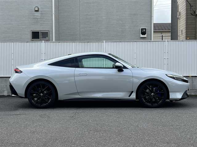 ホンダ プレリュード 栃木県 2025(令7)年 0.1千km パール ワンオーナー/走行距離15Km/BOSEプレミアムサウンドシステム/Google搭載 9インチ Honda CONNECTディスプレイ/10.2インチ デジタルグラフィックメーター/アクティブサウンドコントロール/ドライブモードスイッチ/本革巻ステアリング/パドルシフト/Honda SENSING/・衝突軽減ブレーキ（CMBS）/・先行車発進お知らせ機能/・歩行者事故低減ステアリング/・路外逸脱抑制機能/・標識認識機能/・渋滞追従機能付アダプティブクルーズコントロール（ACC）/・車線維持支援システム（LKAS）/・トラフィックジャムアシスト（渋滞運転支援機能）/・ブラインドスポットインフォメーション/・誤発進抑制機能/・後方誤発進抑制機能/・近距離衝突軽減ブレーキ/・急アクセル抑制機能/・パーキングセンサーシステム/・後退出庫サポート/・アダプティブドライビングビーム/純正19inAW/取扱説明書/保証書/スペアキー１/カラーコード：NH-937P(ムーンリットホワイトパール)