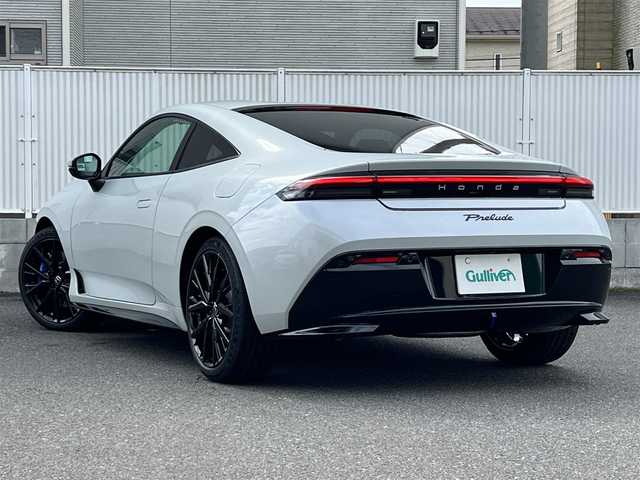 ホンダ プレリュード 栃木県 2025(令7)年 0.1千km パール ワンオーナー/走行距離15Km/BOSEプレミアムサウンドシステム/Google搭載 9インチ Honda CONNECTディスプレイ/10.2インチ デジタルグラフィックメーター/アクティブサウンドコントロール/ドライブモードスイッチ/本革巻ステアリング/パドルシフト/Honda SENSING/・衝突軽減ブレーキ（CMBS）/・先行車発進お知らせ機能/・歩行者事故低減ステアリング/・路外逸脱抑制機能/・標識認識機能/・渋滞追従機能付アダプティブクルーズコントロール（ACC）/・車線維持支援システム（LKAS）/・トラフィックジャムアシスト（渋滞運転支援機能）/・ブラインドスポットインフォメーション/・誤発進抑制機能/・後方誤発進抑制機能/・近距離衝突軽減ブレーキ/・急アクセル抑制機能/・パーキングセンサーシステム/・後退出庫サポート/・アダプティブドライビングビーム/純正19inAW/取扱説明書/保証書/スペアキー１/カラーコード：NH-937P(ムーンリットホワイトパール)