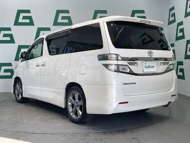 トヨタ ヴェルファイア 2．4Z 鹿児島県 2013(平25)年 13.6万km ホワイトパールクリスタルシャイン 禁煙車/フリップダウンモニター/両側パワースライドドア/サンルーフ/社外SDナビ(AVIC-R2802)/　・Bluetooth/　・CD/DVD/　・フルセグTV/　・AUX/　・AM/FM/　・USB/バックカメラ/ETC/スマホホルダー/コーナーセンサー/純正フロアマット/純正アルミホイール/ステアリングリモコン/電動格納ミラー/オートライト/プッシュスタート