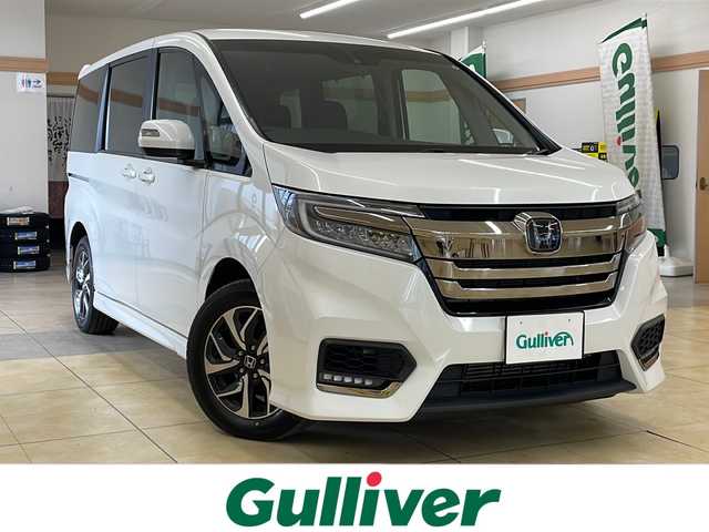 ホンダ ステップワゴン スパーダ クルスピセンシング 道央・札幌 2021(令3)年 5.7万km プラチナホワイトパール ・ワンオーナー/・4WD/・純正9インチナビ/・フルセグTV/DVD/CD/SD/BT/・バックカメラ/・両側パワースライドドア/・ホンダセンシング/・CMBS/・アダプティブクルーズコントロール/・先行車発進お知らせ/・路外逸脱抑制システム/・レーンキープアシスト/・標識認識機能/・パドルシフト/・横滑り防止/・ワイパーデアイサー/・ビルトインETC/・ハーフレザーシート/・前席シートヒーター/・LEDヘッドライト/・LEDフォグ/・アイドリングストップ/・プッシュスタート/・スマートキー/・電格ミラー/・ミラーヒーター