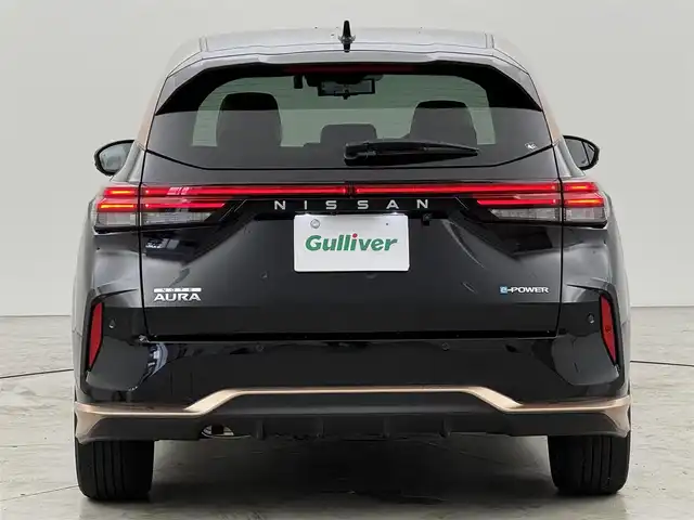 日産 オーラ G レザーエディション 福岡県 2021(令3)年 2.9万km ミッドナイトブラック/サンライズカッパー 純正９型ナビ　/全方位カメラ　/ＢＯＳＥサウンド　/デジタルルームミラー　/ワイヤレス充電　/プロパイロット　/コーナーセンサー/エマージェンシーブレーキ　/レーンキープ　/ＢＳＭ　/シートヒーター　/ステアリングヒーター　/ＬＥＤ