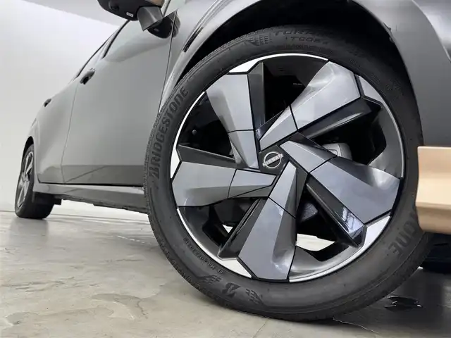日産 オーラ G レザーエディション 福岡県 2021(令3)年 2.9万km ミッドナイトブラック/サンライズカッパー 純正９型ナビ　/全方位カメラ　/ＢＯＳＥサウンド　/デジタルルームミラー　/ワイヤレス充電　/プロパイロット　/コーナーセンサー/エマージェンシーブレーキ　/レーンキープ　/ＢＳＭ　/シートヒーター　/ステアリングヒーター　/ＬＥＤ
