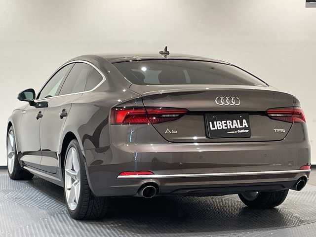 アウディ Ａ５ SB 2．0 TFSI スポーツ 新潟県 2018(平30)年 5万km アーガスブラウンMM ＜オプション装備＞/バーチャルコックピット/ラグジュアリーパッケージ/・パーシャルレザー/・デコラティブパネル オークナチュラルグレー/アシスタンスパッケージ/・パークアシスト/・プレセンスリヤ/・サラウンドビューカメラ/・サイドアシスト/・リヤサイドエアバッグ/マトリクスLEDヘッドライトパッケージ/・マトリクスLEDヘッドライト/・ヘッドライトウォッシャー/＜標準装備＞/アダプティブクルーズコントロール/オートマチックテールゲート/パワーシート（D/N）/シートヒーター（D/N）/MMI ナビゲーション/純正ナビ/・Bluetooth/TV/FM/AM/ドライブレコーダー/プッシュスタート/アイドリングストップ/ETC2.0
