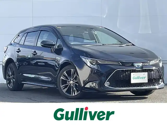トヨタ カローラツーリング ハイブリッド ダブルバイビー 佐賀県 2019(令1)年 2.7万km スパークリングブラックパールクリスタルシャイン トヨタセーフティセンス/・プリクラッシュセーフティ/・レーダークルーズコントロール/・レーントレーシングアシスト/・オートマチックハイビーム/クリアランスソナー/純正ディスプレイオーディオ/・バックカメラ/・フルセグTV/BT/純正17インチAW/LEDヘッドライト/革巻きステアリング/ステアリングヒーター/プッシュスタート/電動パーキングスイッチ/ETC/社外前後ドラレコ/スペアキー×1