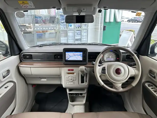 スズキ ラパン ＬＣ X 高知県 2023(令5)年 0.9万km フォーンベージュメタリック/アーバンブラウン 2トーン 社外ナビ/・フルセグTV/・Bluetoothオーディオ/スズキセーフティーサポート/・衝突被害軽減システム/・車線逸脱防止支援システム/・横滑り防止装置/シートヒーター/純正ETC/LEDヘッドライト/オートマチックハイビーム/コーナーセンサー/スペアキー×１/プッシュスタート