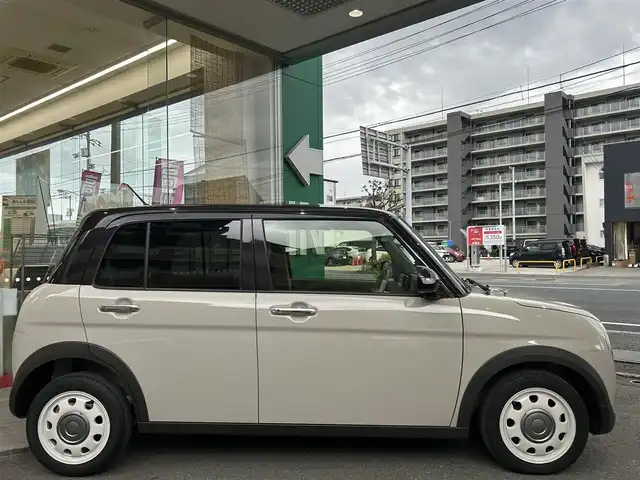 スズキ ラパン ＬＣ X 高知県 2023(令5)年 0.9万km フォーンベージュメタリック/アーバンブラウン 2トーン 社外ナビ/・フルセグTV/・Bluetoothオーディオ/スズキセーフティーサポート/・衝突被害軽減システム/・車線逸脱防止支援システム/・横滑り防止装置/シートヒーター/純正ETC/LEDヘッドライト/オートマチックハイビーム/コーナーセンサー/スペアキー×１/プッシュスタート
