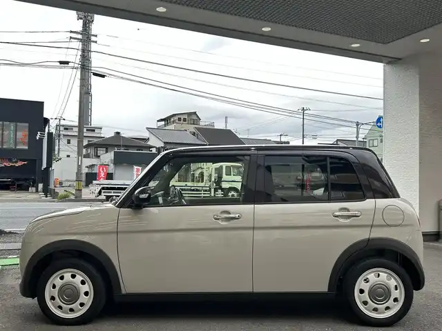 スズキ ラパン ＬＣ X 高知県 2023(令5)年 0.9万km フォーンベージュメタリック/アーバンブラウン 2トーン 社外ナビ/・フルセグTV/・Bluetoothオーディオ/スズキセーフティーサポート/・衝突被害軽減システム/・車線逸脱防止支援システム/・横滑り防止装置/シートヒーター/純正ETC/LEDヘッドライト/オートマチックハイビーム/コーナーセンサー/スペアキー×１/プッシュスタート