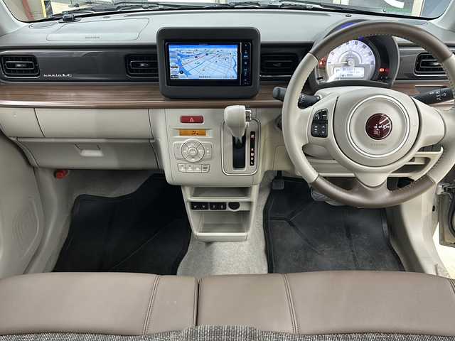 スズキ ラパン ＬＣ X 高知県 2023(令5)年 0.9万km フォーンベージュメタリック/アーバンブラウン 2トーン 社外ナビ/・フルセグTV/・Bluetoothオーディオ/スズキセーフティーサポート/・衝突被害軽減システム/・車線逸脱防止支援システム/・横滑り防止装置/シートヒーター/純正ETC/LEDヘッドライト/オートマチックハイビーム/コーナーセンサー/スペアキー×１/プッシュスタート
