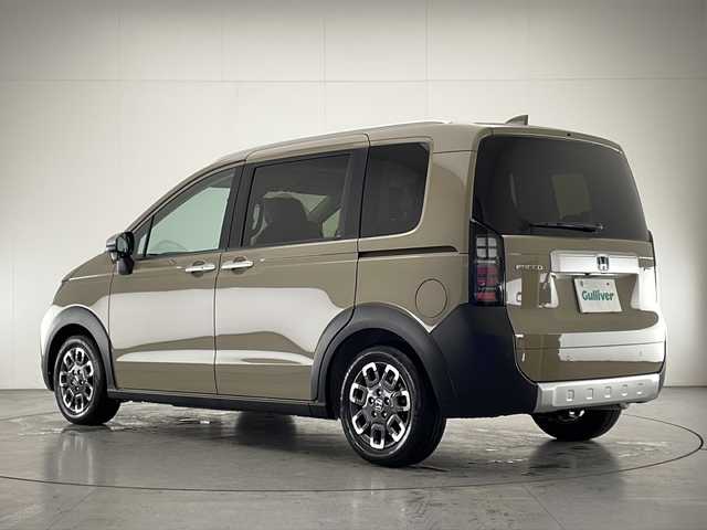 ホンダ フリード ハイブリット e:HEV クロスター 宮崎県 2025(令7)年 0.1千km ベージュ 登録済み未使用車/ホンダセンシング/純正9型ディスプレイオーディオナビTV/（LXM-242ZFNI/HONDA CONNECT/Bluetooth/HDMI/フルセグTV)/純正バックカメラ/純正LEDオートライト/純正LEDフォグ/純正15インチアルミ/両側電動スライドドア/アダプティブクルーズコントロール/レーンディパーチャーアラート/ブラインドスポットモニター/クリアランスソナー/電子パーキング/ブレーキホールド/ハーフレザーシート/前席シートヒーター/オートエアコン/スマートキー/プッシュエンジンスタート/スペアキー/新車時保証書/取扱い説明書
