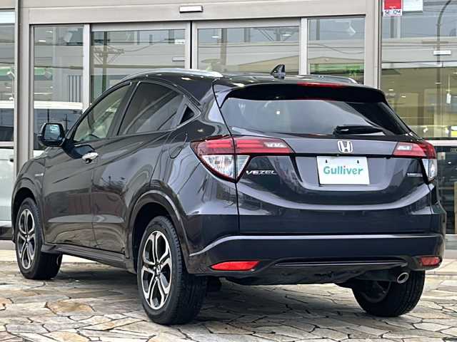 ホンダ ヴェゼル ハイブリッド 静岡県 2016(平28)年 4万km ルーセブラックM 純正ナビ/・CD/DVD/Bluetooth/USB/HDMI/・フルセグTV/ラジオ/主要装備/・バックカメラ　/・ＥＴＣ　/・シートヒーター　/・ハーフレザーシート　/・クルーズコントロール　/・ドライブレコーダー　/・パドルシフト　/・レーンキープアシスト　/・ルーフレール　/・衝突軽減ブレーキ　/・ＬＥＤヘッドライト/・寒冷地仕様/・ステアリングリモコン/・フォグランプ/・オートライト/・プッシュスタート/・スマートキー/・ヒーテッドドアミラー