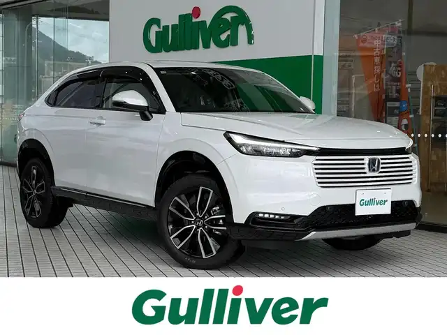 ホンダ ヴェゼル ハイブリッド e:HEV Z 京都府 2025(令7)年 0.1千km プラチナホワイトパール ホンダセンシング/・衝突軽減ブレーキ/・後方誤発進抑制機能/・車線維持支援システム/・アダブティブドライビングビーム/・渋滞追従機能付アダブティブクルーズコントロール/・誤発進抑制機能/・路外逸脱抑制機能/・オートハイビーム/・ブラインドスポットインフォメーション/純正9インチメモリーナビ、地デジ、Bluetooth/USB端子/バックカメラ/ビルトイン2.0ETC/おくだけ充電/ハンドルヒーター/前席シートヒーター/ハンドフリーパワーバックドア/LEDヘッドランプ/スペアキー/純正フロアマット、バイザー付き