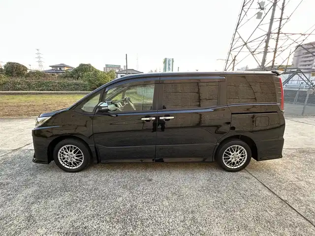 トヨタ ノア ハイブリッド Si ダブルバイビーⅢ 長崎県 2021(令3)年 7.3万km ブラック ワンオーナー/純正9インチナビ/（CD/DVD/BT/フルセグ）/バックカメラ/フリップダウンモニター/衝突軽減システム/レーンアシスト/両側パワースライドドア/クルーズコントロール/ビルトインETC/前席シートヒーター/オートライト/純正16インチAW