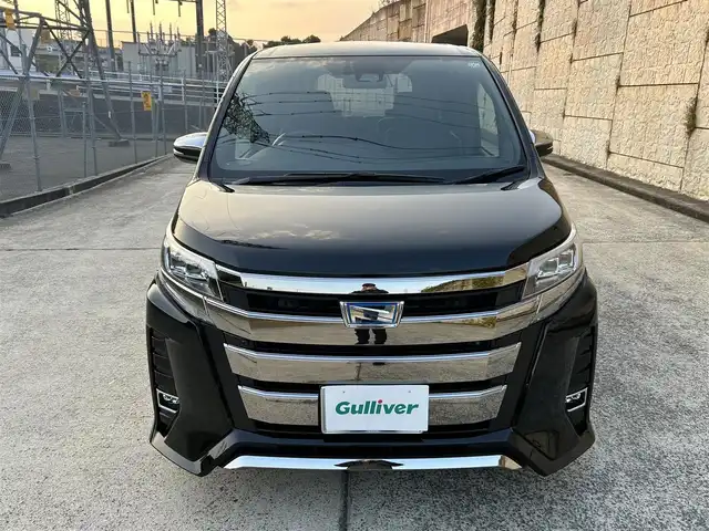 トヨタ ノア ハイブリッド Si ダブルバイビーⅢ 長崎県 2021(令3)年 7.3万km ブラック ワンオーナー/純正9インチナビ/（CD/DVD/BT/フルセグ）/バックカメラ/フリップダウンモニター/衝突軽減システム/レーンアシスト/両側パワースライドドア/クルーズコントロール/ビルトインETC/前席シートヒーター/オートライト/純正16インチAW