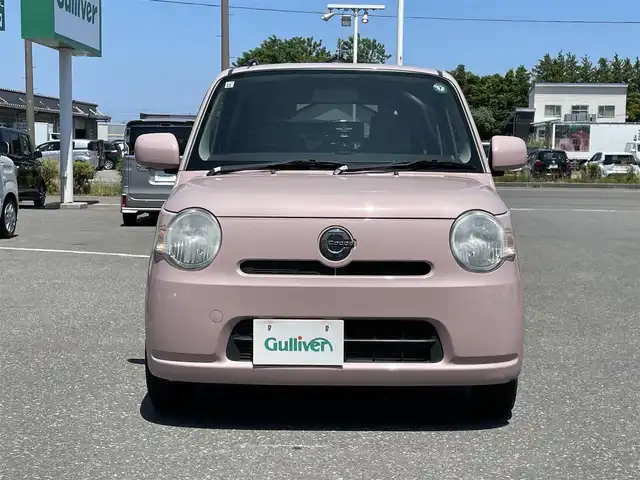 ダイハツ ミラ ココア L 青森県 2015(平27)年 5万km ムースピンクパール ・純正CD/・社外ポータブルナビ/・ワンセグTV/・アイドリングストップ/・電格ドアミラー/・社外１４インチアルミホイール/・純正フロアマット/・ドアバイザー/・新車時保証書/・取扱説明書