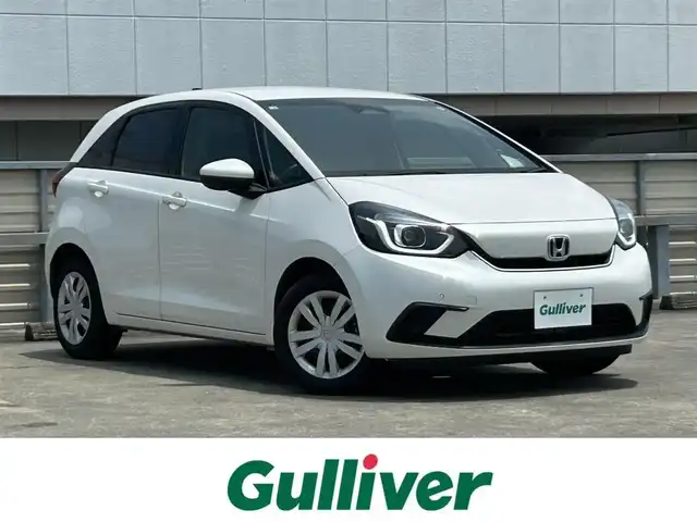 ホンダ フィット e:HEVホーム 鹿児島県 2022(令4)年 2.7万km プラチナホワイトパール ホンダセンシング/イクリプスナビ/バックカメラ/ＢＴオーディオ/ドラレコ/ＥＴＣ/コンビシート/プッシュスタート/スマートキー/ＬＥＤヘッド/サイドカーテンエアバッグ/ＡＣＣ/パーキングソナー
