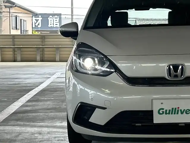 ホンダ フィット e:HEVホーム 鹿児島県 2022(令4)年 2.7万km プラチナホワイトパール ホンダセンシング/イクリプスナビ/バックカメラ/ＢＴオーディオ/ドラレコ/ＥＴＣ/コンビシート/プッシュスタート/スマートキー/ＬＥＤヘッド/サイドカーテンエアバッグ/ＡＣＣ/パーキングソナー