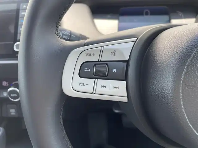 ホンダ フィット e:HEVホーム 群馬県 2024(令6)年 0.2万km プラチナホワイトパール ホンダセンシング/・衝突軽減ブレーキ/・パーキングセンサー警報/・踏み間違い防止/・路外逸脱抑制/純正9インチSDナビ　VXU-245FTi/　(CD DVD Bluetooth SD フルセグ　AM FM）/バックカメラ/LEDヘッドライト/オートライト/クルーズコントロール/USB/純正フロアマット