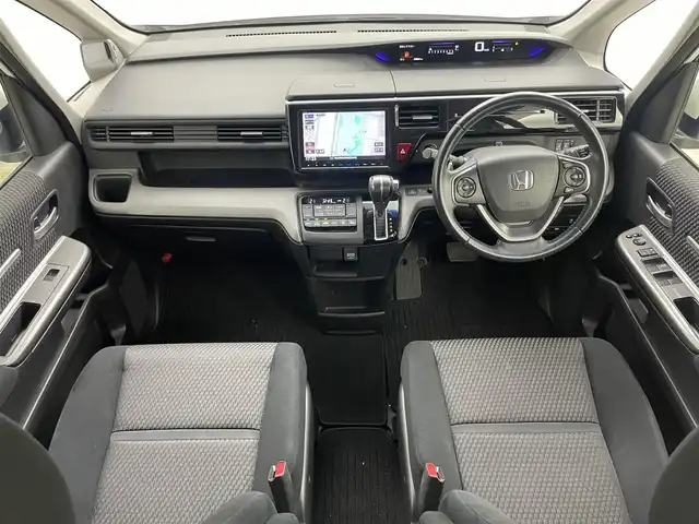 ホンダ ステップワゴン スパーダ ホンダセンシング 岡山県 2016(平28)年 4.8万km ホワイトオーキッドパール 純正9インチナビ　VXM-175VFNi/地デジTV/Bluetooth/DVD/CD/AUX/USB/バックカメラ /フリップダウンモニター/両側パワースライドドア/ビルトインETC/ホンダセンシング /アダプティブクルーズコントロール/LEDヘッドライト/前後ドライブレコーダー/オートライト /レーンキープアシスト/プッシュスタート /スマートキー/純正フロアマット /純正16インチアルミホイール/ミラーヒーター