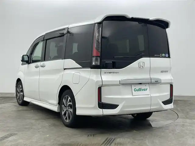 ホンダ ステップワゴン スパーダ ホンダセンシング 岡山県 2016(平28)年 4.8万km ホワイトオーキッドパール 純正9インチナビ　VXM-175VFNi/地デジTV/Bluetooth/DVD/CD/AUX/USB/バックカメラ /フリップダウンモニター/両側パワースライドドア/ビルトインETC/ホンダセンシング /アダプティブクルーズコントロール/LEDヘッドライト/前後ドライブレコーダー/オートライト /レーンキープアシスト/プッシュスタート /スマートキー/純正フロアマット /純正16インチアルミホイール/ミラーヒーター