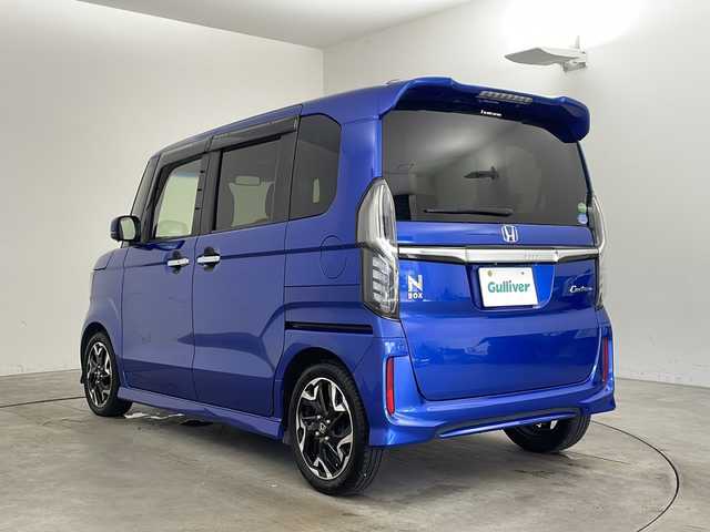 ホンダ Ｎ ＢＯＸ カスタム G L ターボ ホンダセンシング 兵庫県 2017(平29)年 7.2万km ブリリアントスポーティブルーメタリック2トーン ・Honda SENSING/・衝突軽減ブレーキ/・誤発進抑制機能/・後方誤発進抑制機能/・歩行者事故低減ステアリング/・路外逸脱抑制機能/・アダプティブ・クルーズ・コントロール/・車線維持支援システム/・オートハイビーム/・先行車発進お知らせ機能/・標識認識機能/・ビルトインETC車載器/・純正8インチメモリナビ(VXU-185NBi)/CD/DVD/SD/BT/フルセグTV/・バックカメラ/・両側パワースライドドア/・ハーフレザーシート/・パドルシフト/・オートリトラミラー/・プラズマクラスター技術搭載フルオート・エアコンディショナー/・前席用i-サイドエアバッグシステム＋サイドカーテンエアバッグシステム(前席/後席対応)/・純正15インチアルミホイール/・LEDヘッドライト/・LEDフォグライト/・スマートキー/・プッシュスタート/・ステアリングリモコン