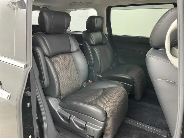 日産 エルグランド 250HWS アーバンクロム 岡山県 2012(平24)年 7.4万km ファントムブラック 社外ナビ　(アルパイン)(VIE-X08S)/【CD/DVD/フルセグ】BT電話のみ対応/社外１０．２インチフリップダウンモニター　(アルパイン)/両側電動スライドドア　/ＨＩＤヘッドライト　/バックカメラ　/後付けコーナーセンサー　前後　/スマートキー　/純正アルミホイール/オートライト/オットマン/禁煙車/フォグライト