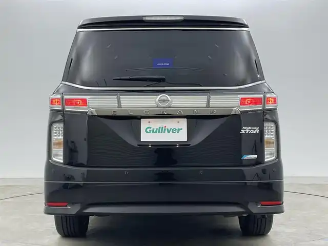 日産 エルグランド 250HWS アーバンクロム 岡山県 2012(平24)年 7.4万km ファントムブラック 社外ナビ　(アルパイン)(VIE-X08S)/【CD/DVD/フルセグ】BT電話のみ対応/社外１０．２インチフリップダウンモニター　(アルパイン)/両側電動スライドドア　/ＨＩＤヘッドライト　/バックカメラ　/後付けコーナーセンサー　前後　/スマートキー　/純正アルミホイール/オートライト/オットマン/禁煙車/フォグライト