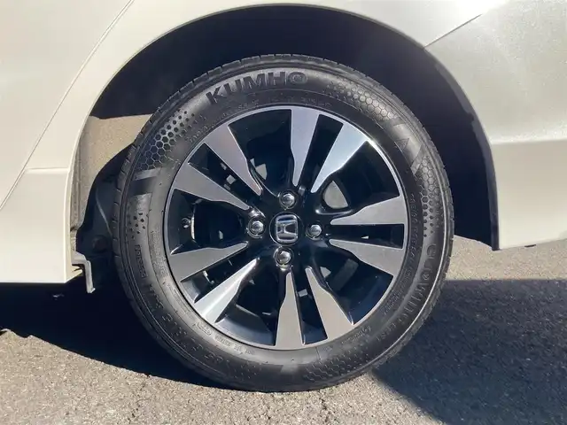 ホンダ シャトル ハイブリッド X 静岡県 2015(平27)年 8.6万km ホワイトオーキッドパール あんしんパッケージ/純正メモリーナビ/　AM FM CD DVD Bluetooth USB/ビルトインETC/前方ドライブレコーダー/LEDオートヘッドランプ/ハーフレザーシート/クルーズコントロール/純正15インチアルミホイール/スマートキー2本/パーキングアシスト/パドルシフト/フロントフォグランプ/シティブレーキアクティブシステム/フルセグTV/バックモニター