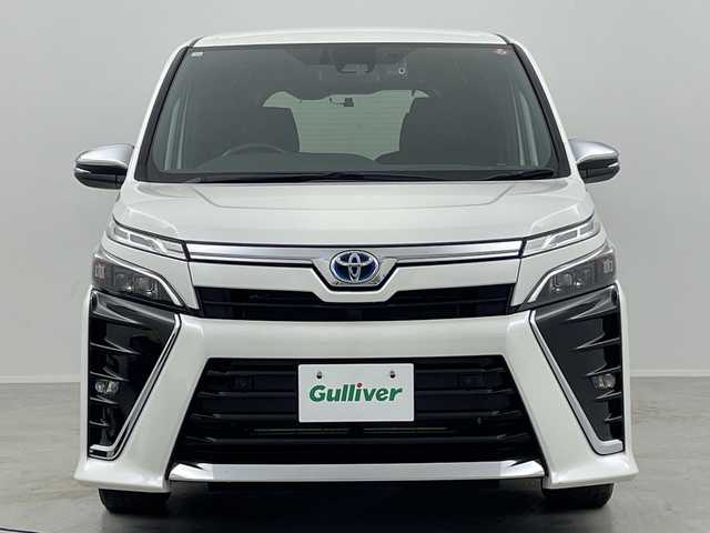 トヨタ ヴォクシー ハイブリッド ZS 煌Ⅲ 福島県 2020(令2)年 3.4万km ホワイトパールクリスタルシャイン /禁煙車//社外９型ナビ/CD・DVD・BT・MSV・フルセグTV//シートヒーター//両側パワースライドドア//前後ドライブレコーダー//トヨタセーフティセンス//クリアランスソナー//オートハイビーム//バックカメラ//クルーズコントロール//ＥＴＣ//ＬＥＤライト//革調シートカバー//ステアリングリモコン//純正アルミ付きサマータイヤ積込//取説・保証書