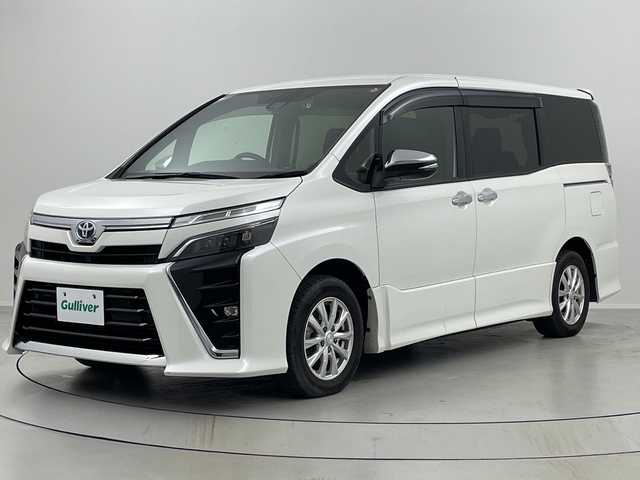 トヨタ ヴォクシー ハイブリッド ZS 煌Ⅲ 福島県 2020(令2)年 3.4万km ホワイトパールクリスタルシャイン /禁煙車//社外９型ナビ/CD・DVD・BT・MSV・フルセグTV//シートヒーター//両側パワースライドドア//前後ドライブレコーダー//トヨタセーフティセンス//クリアランスソナー//オートハイビーム//バックカメラ//クルーズコントロール//ＥＴＣ//ＬＥＤライト//革調シートカバー//ステアリングリモコン//純正アルミ付きサマータイヤ積込//取説・保証書