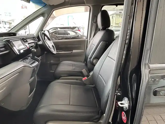 ホンダ ステップワゴン G 兵庫県 2015(平27)年 9万km クリスタルブラックパール 純正ナビ/純正フリップダウンモニター/(CD/DVD/BT/iPod/SD)/フルセグTV/バックカメラ/ETC/片側パワースライドドア/クルーズコントロール/黒革調シートカバー/電動格納ミラー/スマートキー/社外ドアバイザー/純正フロアマット