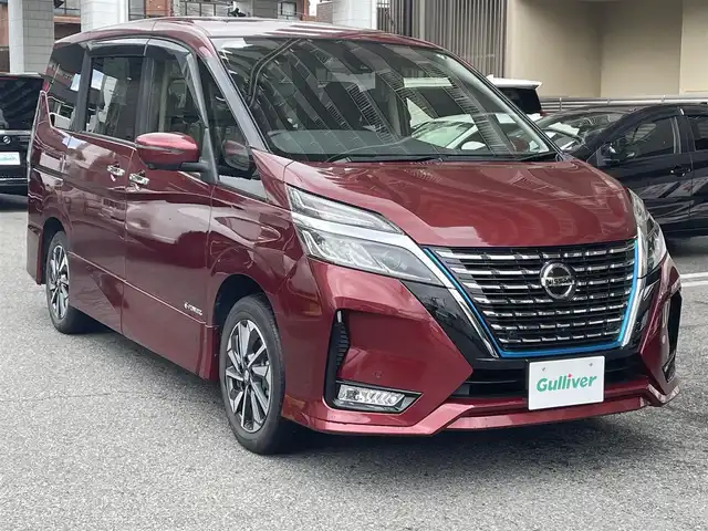 日産 セレナ e－パワー ハイウェイスター V 大阪府 2020(令2)年 4.6万km マルーンレッド プロパイロット/インテリジェントアラウンドビューモニター/インテリジェントパーキングアシスト/インテリジェントLI（車線逸脱防止支援システム）/インテリジェントDA（ふらつき警報）/踏み間違い衝突防止アシスト/標識検知機能/クルーズコントロール/SRSカーテンエアバックシステム＆サイドエアバックシステム（前席）/ブラインドスポット/快適パック/・スーパーUVカット断熱クリーンガラス/・パーソナルテーブル（セカンド・サード左右）/・カップホルダー12個/・USB電源ソケット（セカンド・サード各2個）/・セカンドシート超ロングスライド＋横スライド/・サードシートスライド/・シートバックフック8個/・シートバックポケット/ステアリングヒーター/革巻きステアリング/ステアリングスイッチ/ドライブレコーダー（フロント）/フルセグテレビ（CD・DVD・BT）/USB・HDMI・SDカード/ETC/両側パワースライドドア