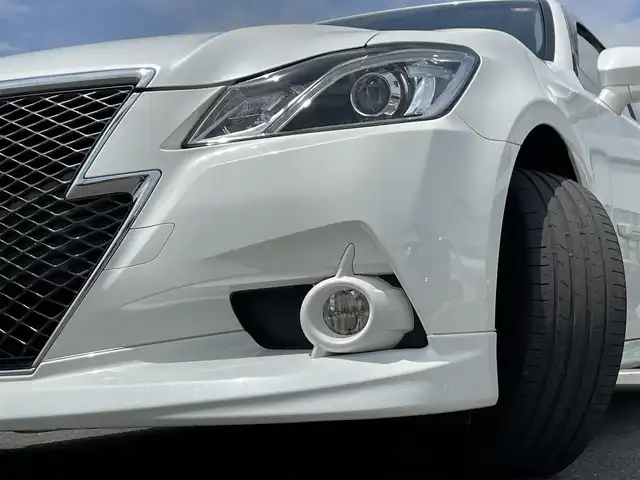 トヨタ クラウン アスリート S 佐賀県 2013(平25)年 7.3万km ホワイトパールクリスタルシャイン 純正８インチナビ/フルセグＴＶ　ＣＤ　ＤＶＤ　ＵＳＢ　ＢＴ/バックカメラ/Ｄ＋Ｎ席パワーシート/ＩＳＯＦＩＸ/革巻きステアリング/ステアリングリモコン/モデリスタエアロ/純正18インチアルミホイール/純正キセノンヘッドライト/クルーズコントロール/横滑り防止装置/フォグライト/ウィンカーミラー/ドアバイザ―/プッシュスタート/スマートキー/スペアキー１本/保証書/取扱説明書