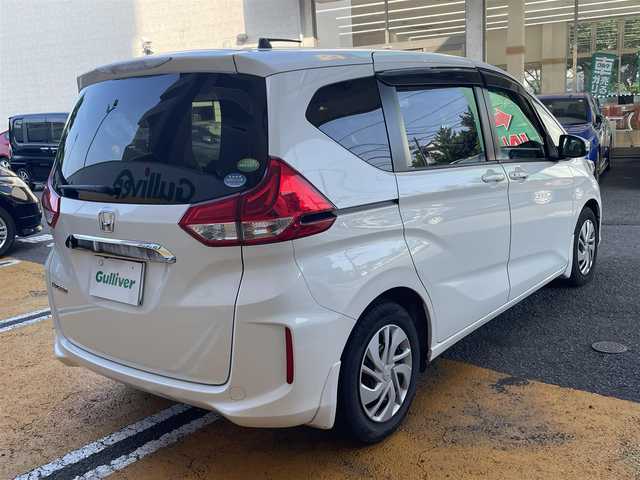 ホンダ フリード G ホンダセンシング 静岡県 2016(平28)年 7.4万km ホワイトオーキッドパール ワンオーナー/純正ナビ/フルセグTV/DVD/CD/SD/BT/MSV/バックカメラ/両側パワースライドドア/衝突軽減ブレーキ/レーンキープアシスト/レーダークルーズコントロール/ビルトインETC/LEDヘッドライト/スマートキー×2/保証書/取扱説明書/ナビ取扱説明書/R1/3/5点検記録簿有