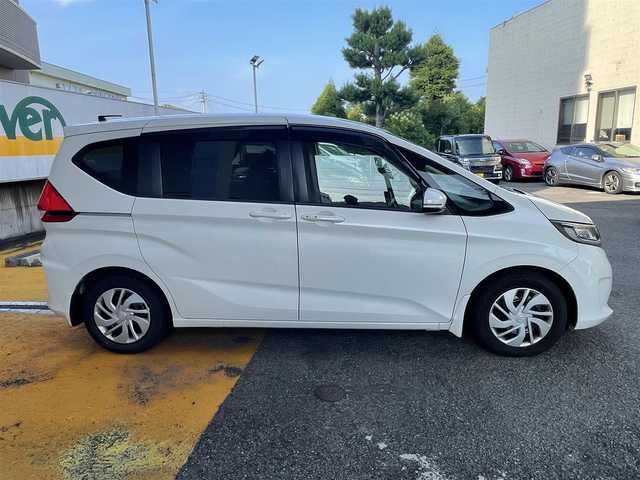 ホンダ フリード G ホンダセンシング 静岡県 2016(平28)年 7.4万km ホワイトオーキッドパール ワンオーナー/純正ナビ/フルセグTV/DVD/CD/SD/BT/MSV/バックカメラ/両側パワースライドドア/衝突軽減ブレーキ/レーンキープアシスト/レーダークルーズコントロール/ビルトインETC/LEDヘッドライト/スマートキー×2/保証書/取扱説明書/ナビ取扱説明書/R1/3/5点検記録簿有