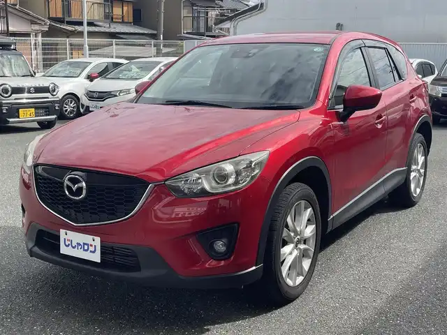 マツダ ＣＸ－５ XD Lパッケージ 愛知県 2013(平25)年 9.6万km ソウルレッドプレミアムメタリック (株)IDOMが運営する【じしゃロン豊川店】の自社ローン専用車両になります。こちらは現金またはオートローンご利用時の価格です。自社ローンご希望の方は別途その旨お申付け下さい/ 純正メモリナビ/　◯ CD再生機能/　◯ DVD再生機能/　◯ BT対応/　◯ フルセグTV/ バックカメラ/ ETC/ 革巻ステアリング/ ステアリングスイッチ/ クルーズコントロール/ オートライト/ レザーシート/ 運転席パワーシート/ フリップダウンモニター/ 前席シートヒーター/ トノカバー/ ウインカーミラー/ ドアバイザー/ 純正フロアマット