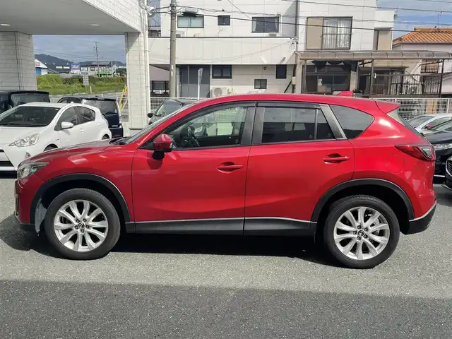 マツダ ＣＸ－５ XD Lパッケージ 愛知県 2013(平25)年 9.6万km ソウルレッドプレミアムメタリック (株)IDOMが運営する【じしゃロン豊川店】の自社ローン専用車両になります。こちらは現金またはオートローンご利用時の価格です。自社ローンご希望の方は別途その旨お申付け下さい/ 純正メモリナビ/　◯ CD再生機能/　◯ DVD再生機能/　◯ BT対応/　◯ フルセグTV/ バックカメラ/ ETC/ 革巻ステアリング/ ステアリングスイッチ/ クルーズコントロール/ オートライト/ レザーシート/ 運転席パワーシート/ フリップダウンモニター/ 前席シートヒーター/ トノカバー/ ウインカーミラー/ ドアバイザー/ 純正フロアマット