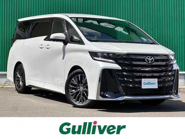 トヨタ ヴェルファイア Z プレミア 宮城県 2024(令6)年 0.9万km プラチナホワイトパールマイカ デジタルインナーミラー/ユニバーサルステップ/＝＝＝/左右独立ムーンルーフ/トヨタチームメイト/・アドバンストパーク/・パーキングサポートブレーキ（周辺静止物）/・アドバンストドライブ/・緊急時操舵支援/・フロントクロストラフィックアラート/・レーンチェンジアシスト/・ドライバーモニターカメラ/セーフティセンス/・プリクラッシュセーフティ/・レーントレーシングアシスト/・全車速追従機能付レーダークルーズコントロール/・アダプティブハイビームシステム/・ロードサインアシスト/・ドライバー異常時対応システム/・プロアクティブドライビングアシスト/・発進遅れ告知機能/BSM/パーキングサポートブレーキ/13インチフリップダウンモニター/14インチディスプレイオーディオ/・車載ナビ/・地デジTV/・USB/HDMI/・ETC2.0/床下透過表示機能付パノラミックビューモニター/ヘッドアップディスプレイ/両側パワースライドドア/パワーバックドア/本革シート/シートヒーター/ベンチレーション/ステアヒーター