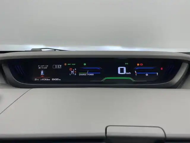 ホンダ フリード ハイブリット G ホンダセンシング 愛知県 2021(令3)年 5.5万km スーパープラチナグレーメタリック 社外８型ナビ　社外後席モニター　禁煙　黒ハーフレザー　ＨＤＭＩ　両側パワスラ　ＥＴＣ　シートヒーター　ホンダセンシング　衝突軽減　追従クルコン　フルセグＴＶ　カープレイ　ＤＶＤ　ＬＥＤオートライト