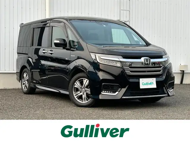 ホンダ ステップワゴン スパーダ ハイブリッド G EX ホンダセンシング 熊本県 2018(平30)年 5.6万km プレミアムスパークルブラックパール 純正メモリナビ/・AM/FM/CD/DVD/SD/USB/iPod/Music Rack/・Bluetooth/・フルセグTV/・全周囲カメラ/ホンダセンシング/・CMBS警告距離/・ACC先行車検知音/・先行車発進お知らせ/・路外逸脱抑制システム/・レーンキープアシスト/・標識認識機能/ビルトインETC/パーキングアシスト/ボタン式サイドブレーキ/ホールドブレーキ/ステアリングスイッチ/革巻きステアリング/USB充電×２/ロール式サンシェード/ドアバイザー/フォグランプ/純正フロアマット