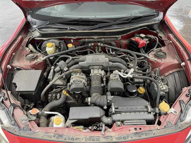 トヨタ ８６ GT リミテッド 三重県 2012(平24)年 2.8万km ライトニングレッド プレミアムガソリン/FR/6F/純正 7インチナビ NSZT-W62G/（AM/FM/CD/DVD/SD/SDREC/TV/DS/Bluetooth）/ETC/モデリスタエアロ（F/S/R）/［TRD］エアロスタビライジングカバー（リヤガラスとトランクドアの間を埋めるパーツ）/ルーフスポイラー［社外品：Grazio&Co.（グラージオ・アンド・シーオー）］/トランクスポイラー［GT Limited標準装備］/安全/・ABS/・VSC（ビークル・スタビリティ・コントロール）/・トラクションコントロール（TRACK機能付）/・ヒルスタートアシスト/・緊急ブレーキシグナル/・SRS 運転席・助手席＋サイド＋カーテンシールドエアバッグ/装備/・ハーフレザーシート（本革×アルカンターラ）/・シートヒーター（D/N）/・左右独立オートエアコン/・コンライト（ヘッドライト自動点灯・自動消灯システム）/・LEDヘッドランプ/・フロント（LED）＆リヤフォグランプ/・電動格納ドアミラー/・パワーステアリング/・パワーウインドウ/・プッシュスタート/・純正17inAW/・スマートキーx2/など
