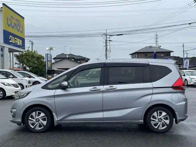 ホンダ フリード ハイブリット G ホンダセンシング 佐賀県 2017(平29)年 10.9万km ルナシルバーM こちらは現金またはオートローンご利用時の価格です。/自社ローンご希望の方は別途その旨お申付け下さい/禁煙車/純正ナビVXM-174VFi（ＣＤ・ＤＶＤ・フルセグ・ＢＴ・ＳＤ）/バックカメラ　/社外前後ドライブレコーダー　/ビルトインＥＴＣ　/両側パワースライドドア　/レーダークルーズコントロール　/衝突軽減ブレーキ　/レーンキープアシスト/横滑り防止/先行車発進お知らせ/車線逸脱警報/アイドリングストップ/純正フロアマット/オートライト/HIDライト/フォグライト/スマートキー/プッシュスタート/スペアキー1本/保証書